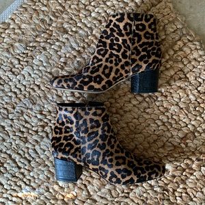 Leopard look cow hair on hide ankle boots.